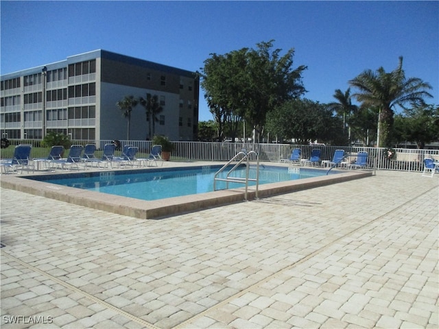 view of pool featuring a patio