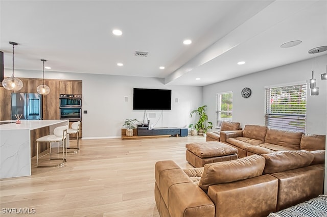 living room featuring light wood-type flooring