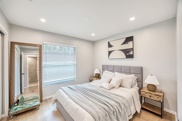 bedroom featuring light hardwood / wood-style floors