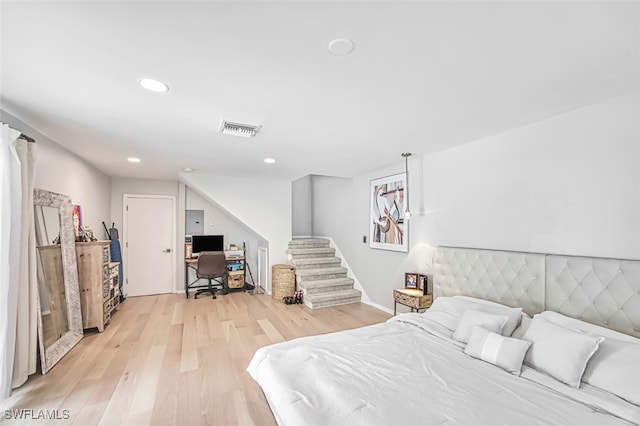 bedroom with light hardwood / wood-style floors