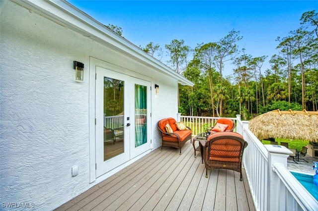 wooden deck with french doors