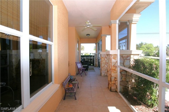 view of patio with ceiling fan