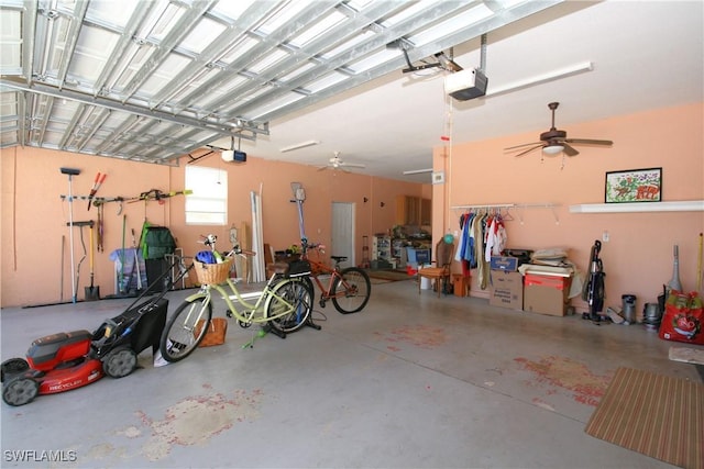 garage featuring ceiling fan and a garage door opener