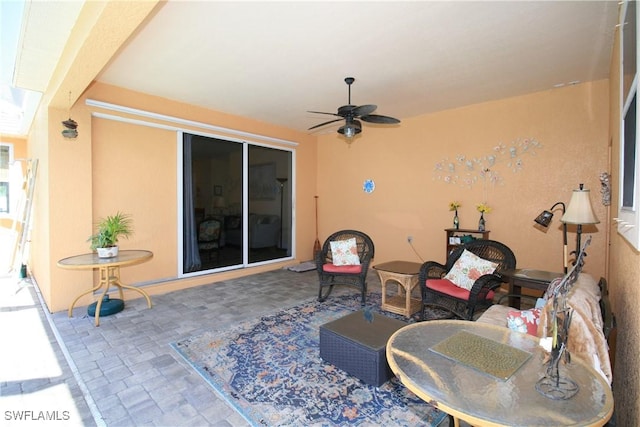 view of patio with ceiling fan