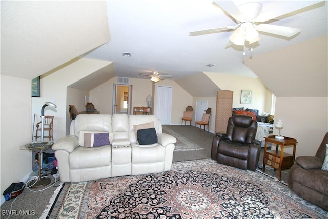 carpeted living room featuring ceiling fan and lofted ceiling