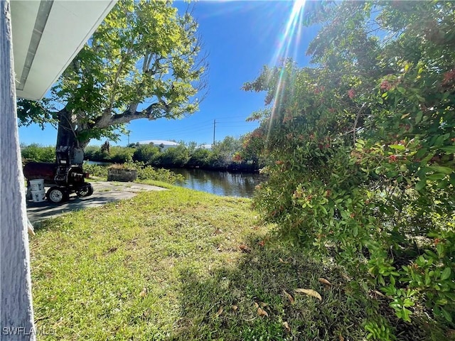 view of yard with a water view