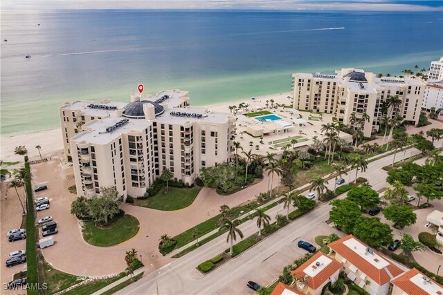 aerial view featuring a water view and a view of the beach