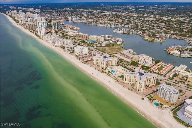 aerial view featuring a water view and a view of the beach