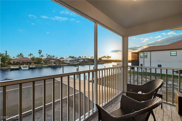 balcony featuring a water view