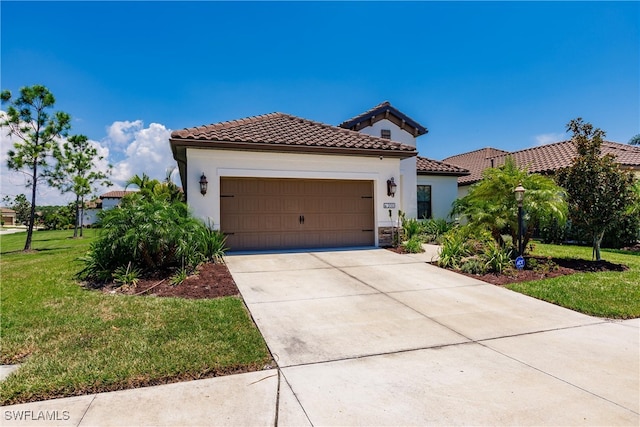 mediterranean / spanish-style home with a front yard and a garage