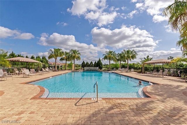 view of pool featuring a gazebo and a patio