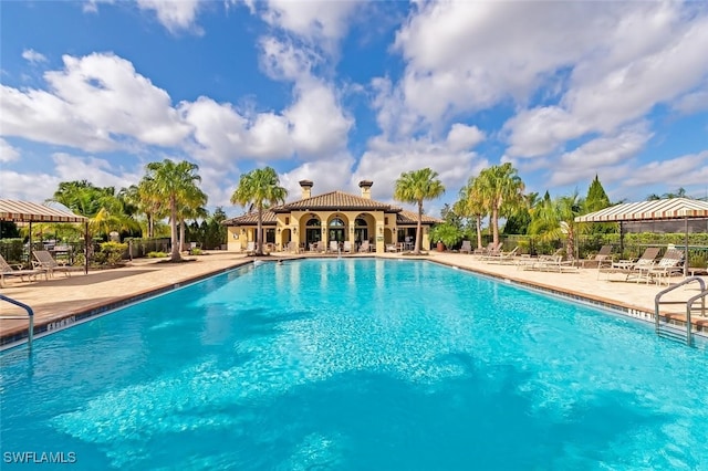 view of swimming pool featuring a gazebo and a patio area