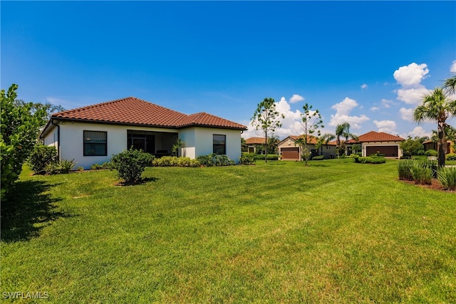 view of yard featuring a garage