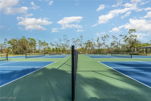 view of tennis court featuring basketball court