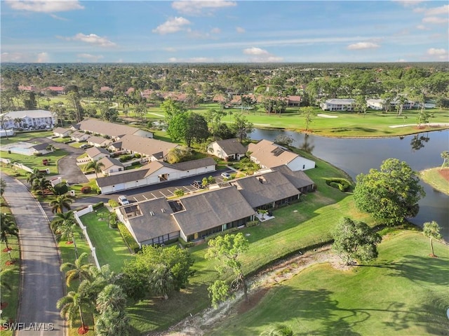 aerial view featuring a water view, view of golf course, and a residential view