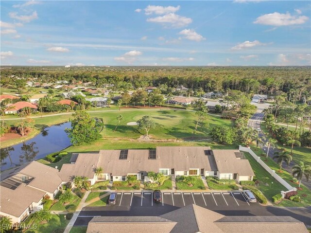 bird's eye view featuring a water view and a residential view