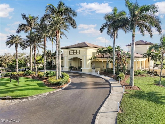 exterior space with a yard and driveway