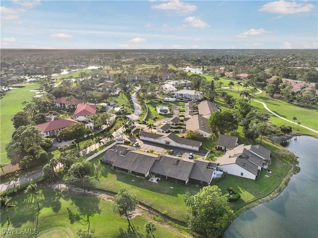 aerial view featuring view of golf course, a water view, and a residential view