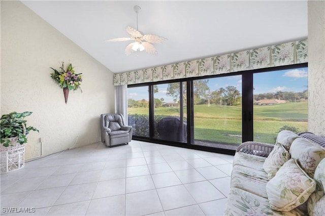 sunroom featuring lofted ceiling and ceiling fan