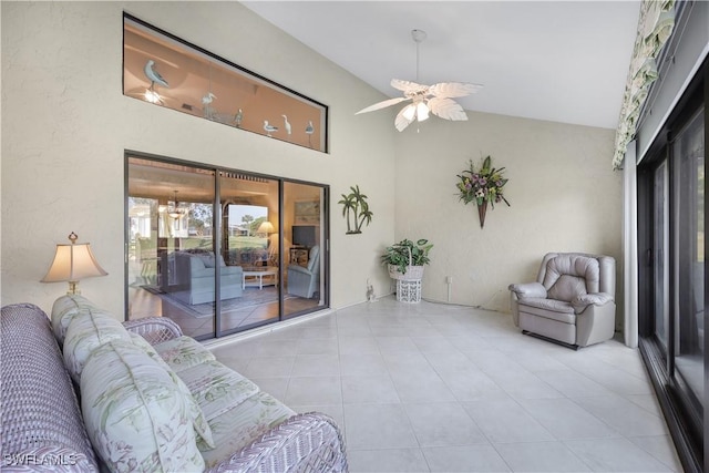 interior space with ceiling fan