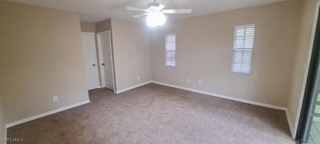 880 Wilson Blvd N, Naples, FL 34120 - unfurnished bedroom featuring carpet and ceiling fan