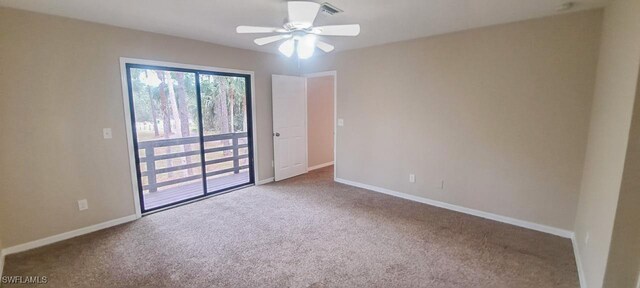 carpeted empty room with ceiling fan