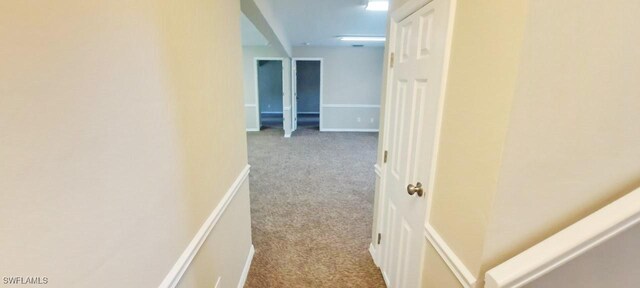 880 Wilson Blvd N, Naples, FL 34120 - corridor featuring carpet flooring and baseboards