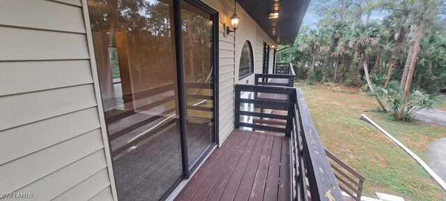 880 Wilson Blvd N, Naples, FL 34120 - wooden deck with a yard