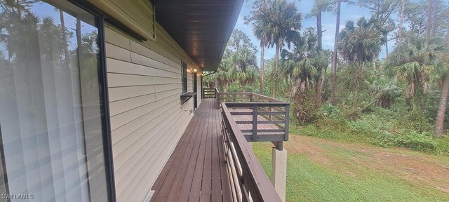880 Wilson Blvd N, Naples, FL 34120 - wooden terrace featuring a yard