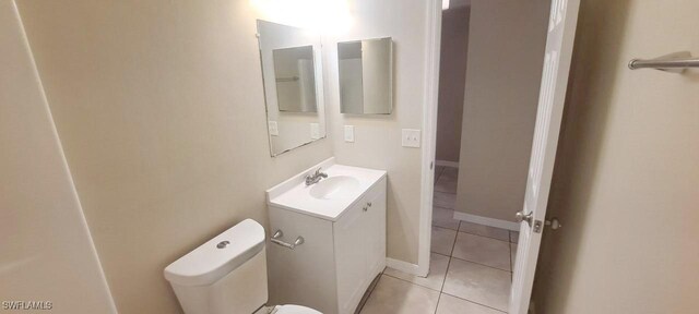 880 Wilson Blvd N, Naples, FL 34120 - bathroom featuring vanity and tile patterned flooring