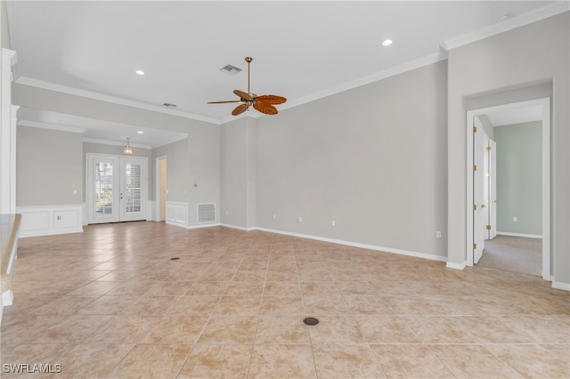 unfurnished living room with crown molding, french doors, and ceiling fan