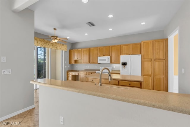 kitchen featuring ceiling fan, light tile patterned flooring, white appliances, and sink