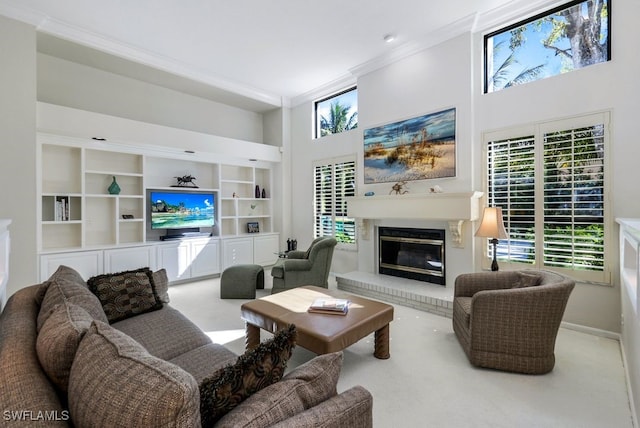 living room featuring crown molding, carpet floors, and a high ceiling