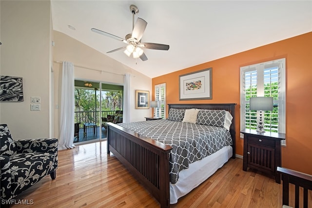 bedroom with light hardwood / wood-style flooring, vaulted ceiling, and ceiling fan