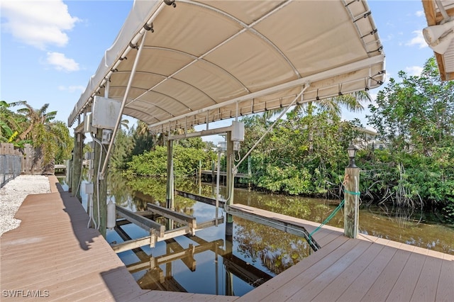 view of dock featuring a water view