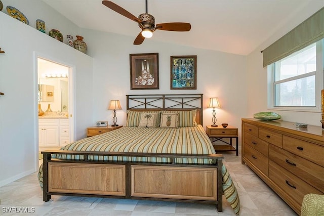 bedroom featuring ensuite bath, ceiling fan, and lofted ceiling