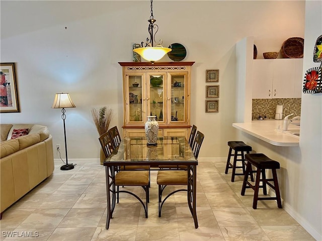 dining area with baseboards