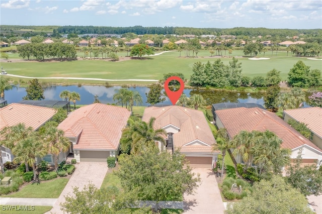 bird's eye view featuring golf course view and a water view