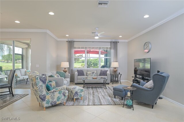 living room featuring ornamental molding, recessed lighting, visible vents, and baseboards