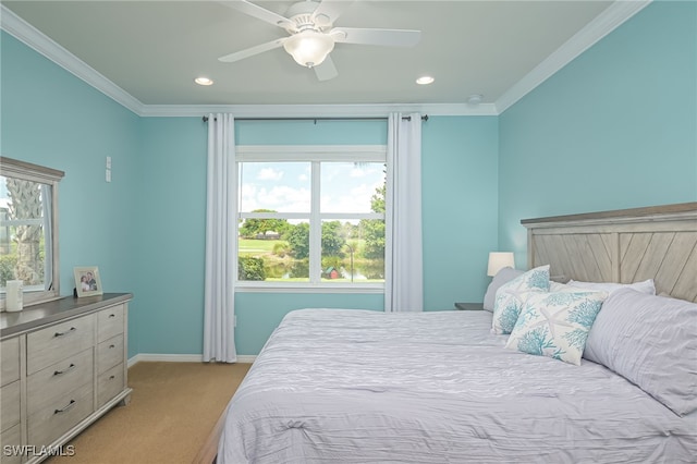 bedroom featuring recessed lighting, light carpet, a ceiling fan, baseboards, and crown molding