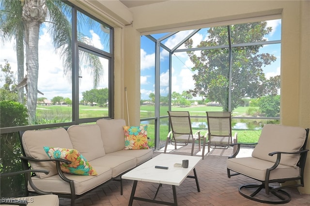 sunroom with a water view