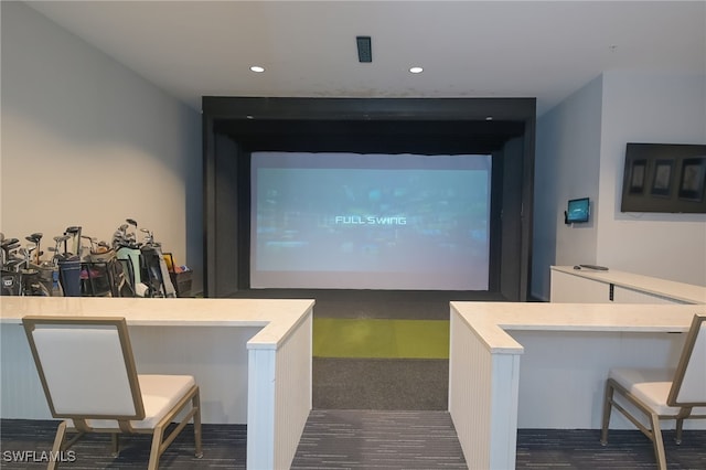 cinema room with golf simulator and recessed lighting