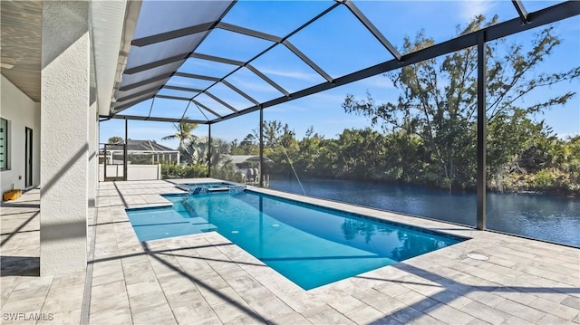 view of swimming pool with a water view, an in ground hot tub, a lanai, and a patio area