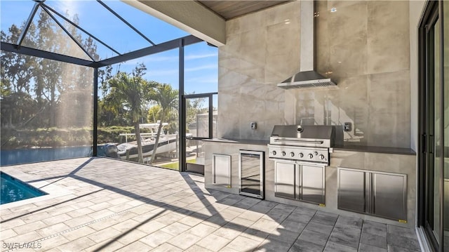 view of patio / terrace featuring a grill, a lanai, and area for grilling