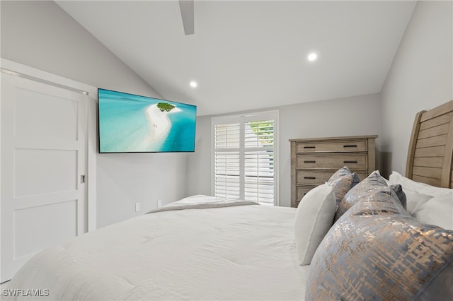 bedroom featuring vaulted ceiling and ceiling fan