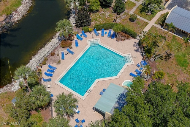 drone / aerial view with a water view