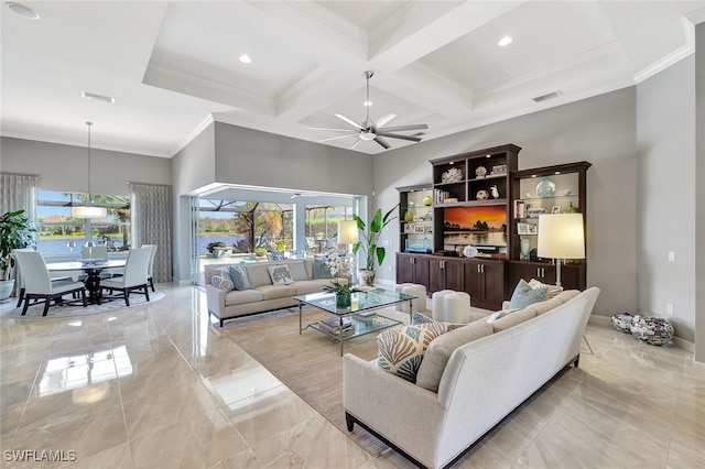 living room featuring ceiling fan, coffered ceiling, beamed ceiling, crown molding, and a towering ceiling