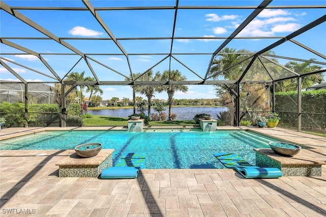 view of swimming pool with pool water feature, a water view, a patio area, and a lanai