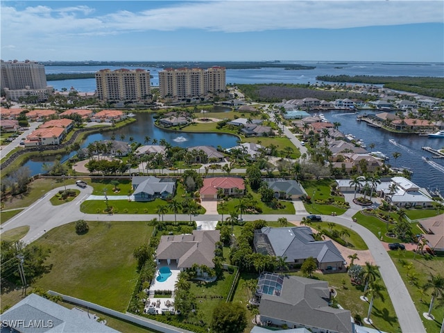 drone / aerial view with a water view