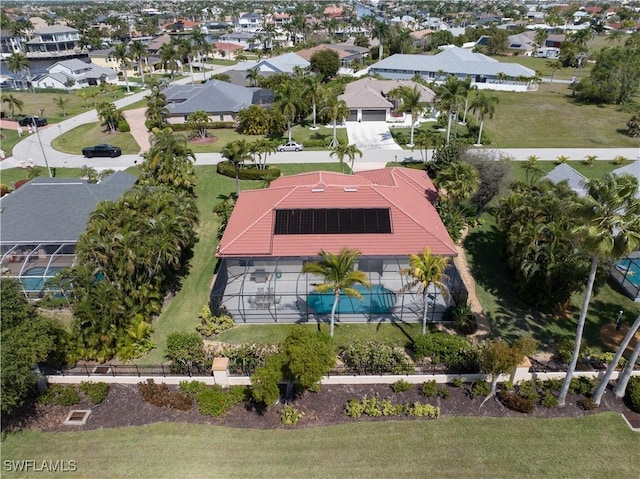 birds eye view of property with a residential view